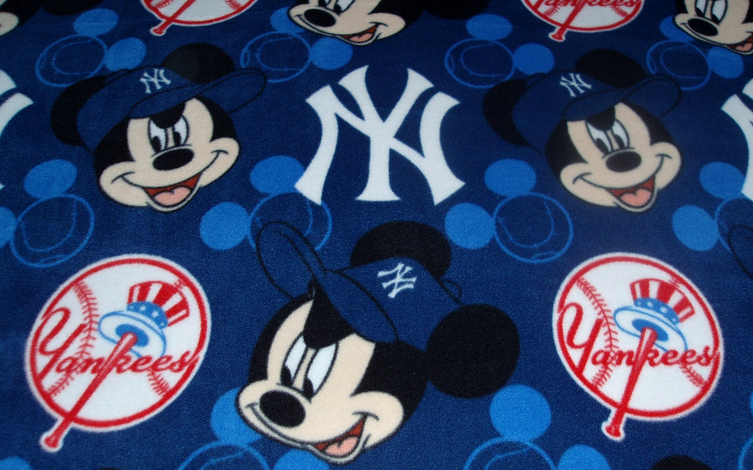 NY Yankees Mickey Mouse Fleece Fabric, Over, Throw. helpful non helpful. et...
